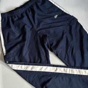 Nike navy blue & white striped track pants. Men’s size XL